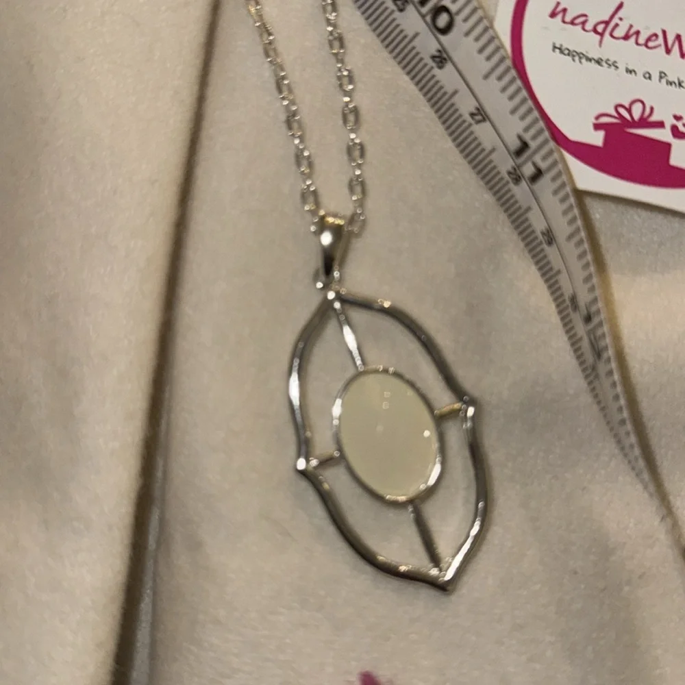 Nadine West silver tone